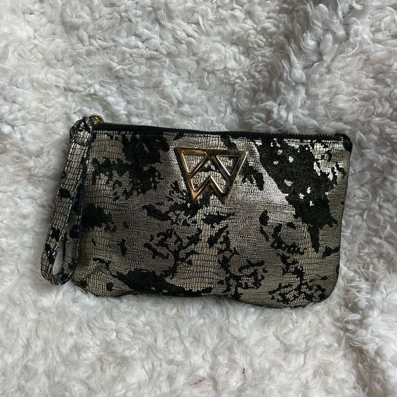 Kelly Wynne metallic gold and black wristlet with a gold tone logo accent - Picture 4 of 8